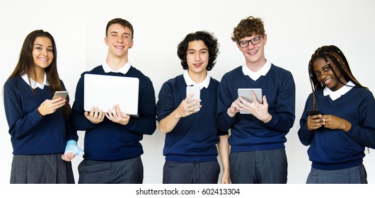 Group of students using digital devices techie