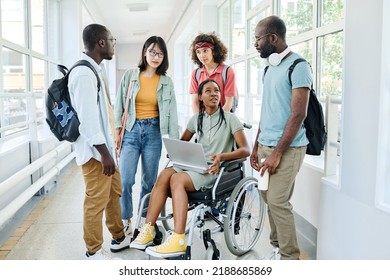 Group of students using laptop at break - Powered by Shutterstock