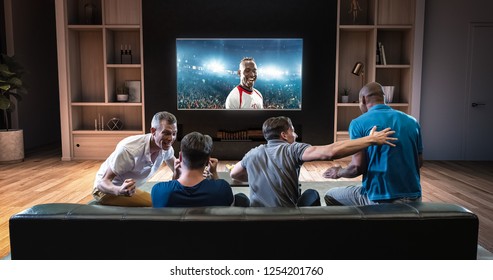 Group of students are watching a soccer moment on the TV and celebrating a goal, sitting on the couch in the living room. The living room is made in 3D. - Shutterstock ID 1254201760