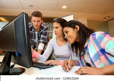 Group Of Students Working In Computer Lab