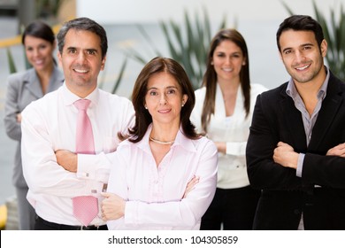 Group Of Successful Business People Looking Confident