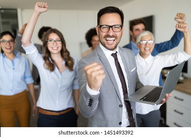 Group of successful business people in office