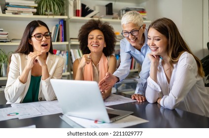 Group of successful business women working together in office. Business people meeting concept. - Powered by Shutterstock