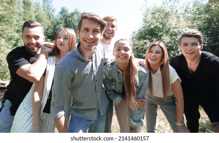 Group Of Successful Youth On The Background Of Nature