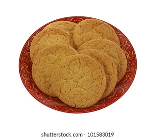 A Group Of Sugar Cookies On A Red Plate.