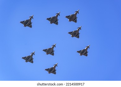 Group Of Supersonic Planes In Formation Flying In The Sky In A Military Parade.