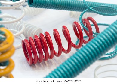 The Group Of Suspension Coil Spring On The White Background.Automotive Part 