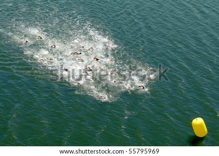 Group of swimmers during a competition in the sea