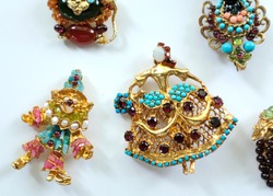 A Group Of Swoboda Vintage Brooch Made From A Variety Of Colourful Semi-precious Stones In Gold.