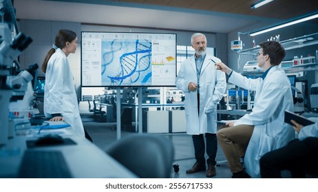 Group of Talented Female and Male STEM Students Having a Meeting with Their Senior Teacher in a Modern Laboratory. Professor Showing a Presentation About Biochemistry or
Biophysics on Screen