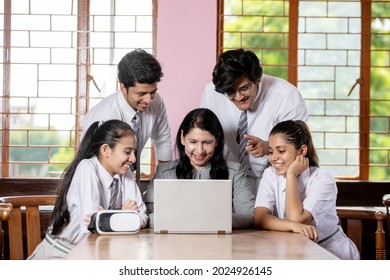 Group Of Teacher And Student Learning And Having Fun Together 