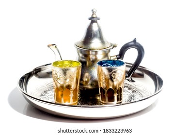 Group of teapot and glasses of oriental tea on a tray on white background - Shutterstock ID 1833223963