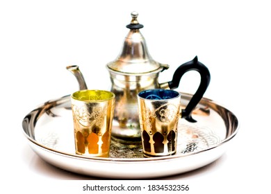 Group of teapot and glasses of oriental tea on a tray on white background - Shutterstock ID 1834532356