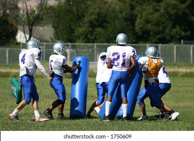 A Group Of Teen At Football Practice