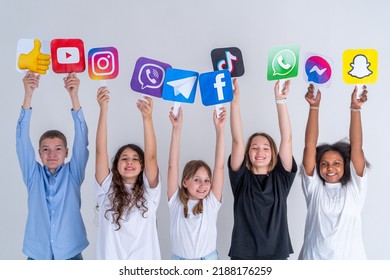A Group Of Teen Kids Are Holding Social Media Icons Of Instagram, Youtube, Tiktok, Whatsapp In Their Hands And Smiling. Turkey, Istanbul, May 29, 2022.