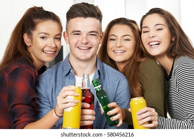 Group Of Teenagers Drinking Alcohol At Party