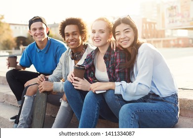 Group Of Teenagers Hanging Out In Skate Park, Having Coffee Break In Active Sports, Free Space