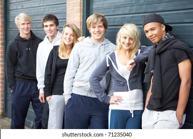 Group Of Teenagers Hanging Out Together Outside