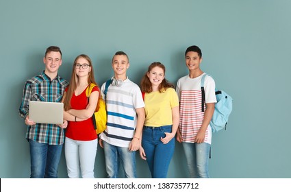 Group Of Teenagers On Color Background