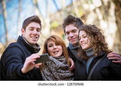 Group of teenagers posing for a photograph,Italy
