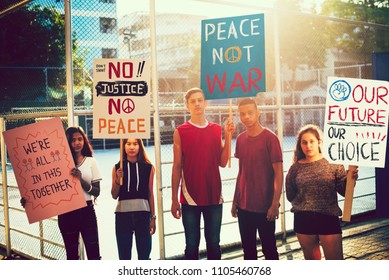 Group Of Teenagers Protesting Against War