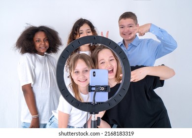 A Group Of Teenagers Shoot A Video On Tiktok, A Phone On A Tripod. Selfie. Turkey, Istanbul, May 29, 2022.