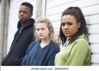 Group Of Teenagers In Urban Environment