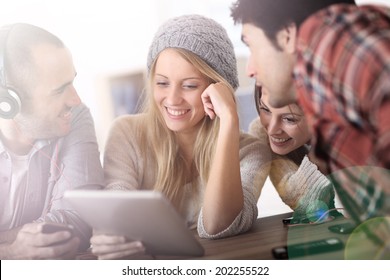 Group of teens using digital technologies - Powered by Shutterstock