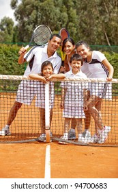 Group Of Tennis Players Of All Ages At The Court