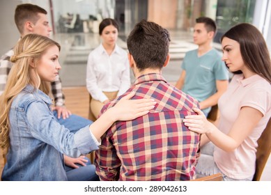 Group therapy. Group of people sitting close to each other and communicating. - Powered by Shutterstock