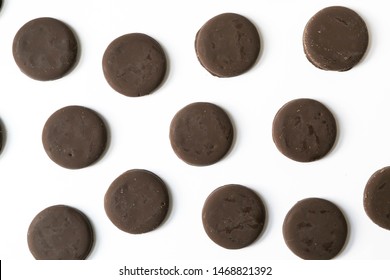 Group Of Thin Mints Cookies On White Background, Chocolate Mint Thin Round Cookies, Top View