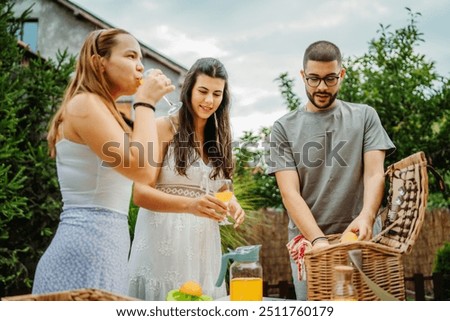 Similar – Infused fruit water cocktails and people talking in background