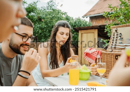 Similar – Infused fruit water cocktails and people talking in background