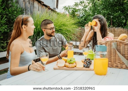 Similar – Infused fruit water cocktails and people talking in background