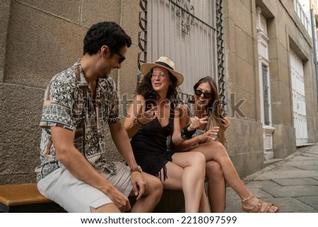 Similar – Smiling young woman looking at camera over sunglasses