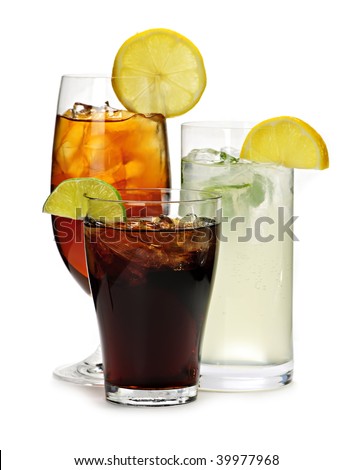 Group of three soft drinks in various glasses with garnish