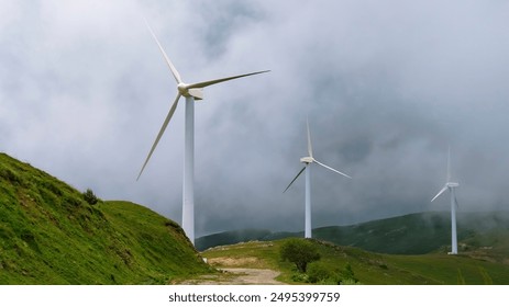 Group of three wind generators at the tp of mountain