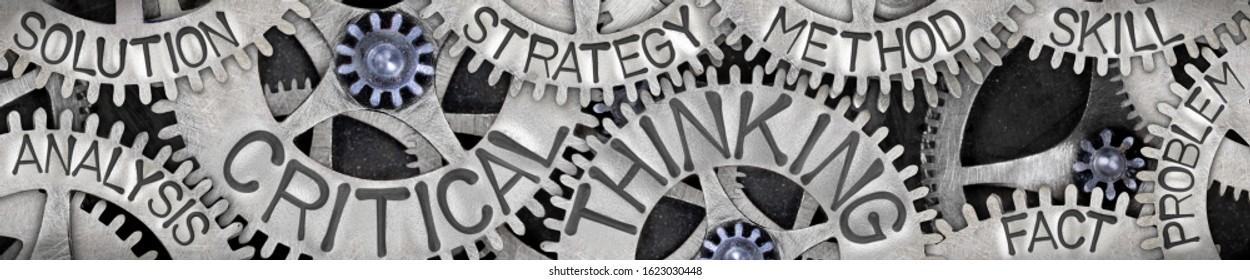 Group of tooth wheel mechanism with Critical Thinking, Strategy, Skill, Solution and Fact words imprinted on metal surface.