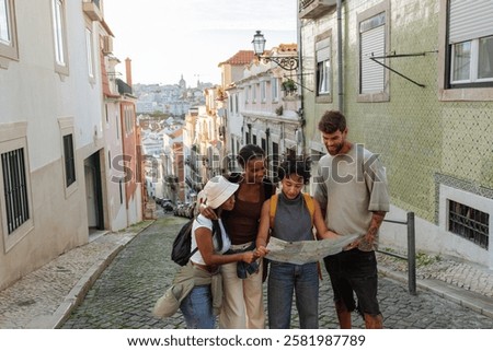 Group of tourists consulting a map while discovering the vibrant streets of lisbon, portugal, enjoying their adventure in the historic city
