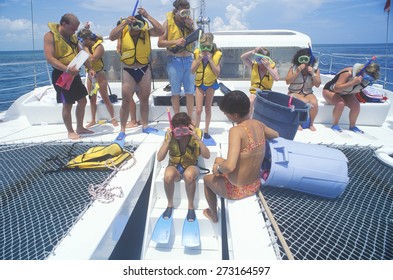 Group Of Tourists On  Catamaran Tour Boat Preparing To Snorkel, Key West, FL