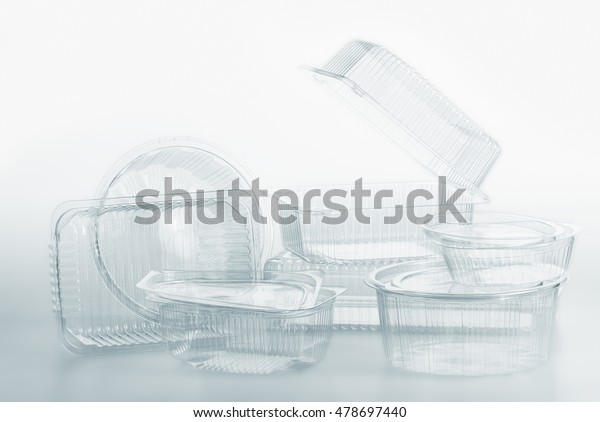Group of transparent plastic containers box of\
food package on white\
background