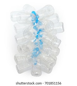Group of transparent plastic empty bottles with blue cap tied with a red rope on white background