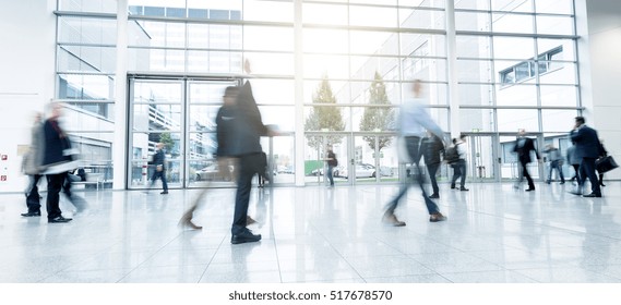 Group Of Unrecognizable Business People At A Trade Fair Floor