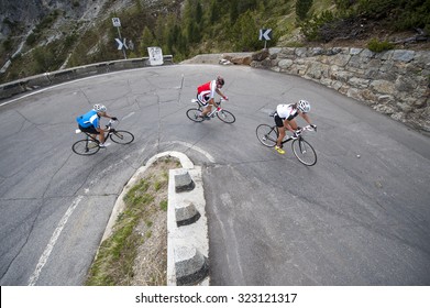 Group Uphill Road Cycling On Stelvio Pass