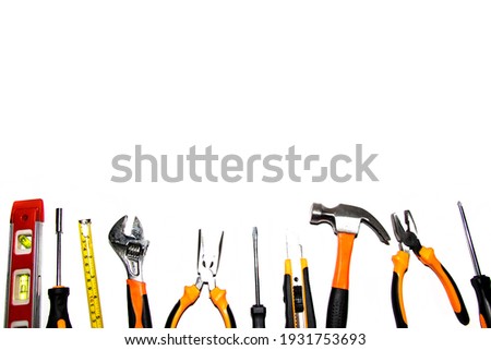 Group of used mechanical tools on a white background. With place for text, top view.