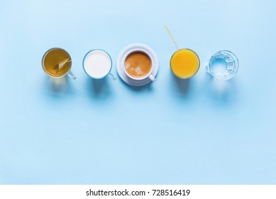 Group Useful Colorful Beverages Drink Coffee Milk Tea Orange Juice Water Flat Lay Still Life Table Top View Blue Background