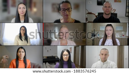 Group Using Video Conferencing technology in office for video call with colleagues abroad. People look at web cameras listen webinar lecture participate group conference call with female leader.
