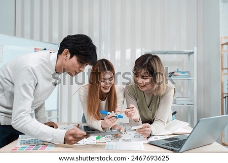 Group of ux developer and ui designer brainstorming about app interface design at modern office. Creative digital development agency