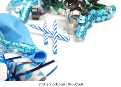 A Group Of Various Blue Party Supplies On A White Background With Plenty Of Copyspace.