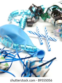 A Group Of Various Blue Party Supplies On A White Background.